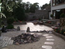 Patio with rock pool water feature